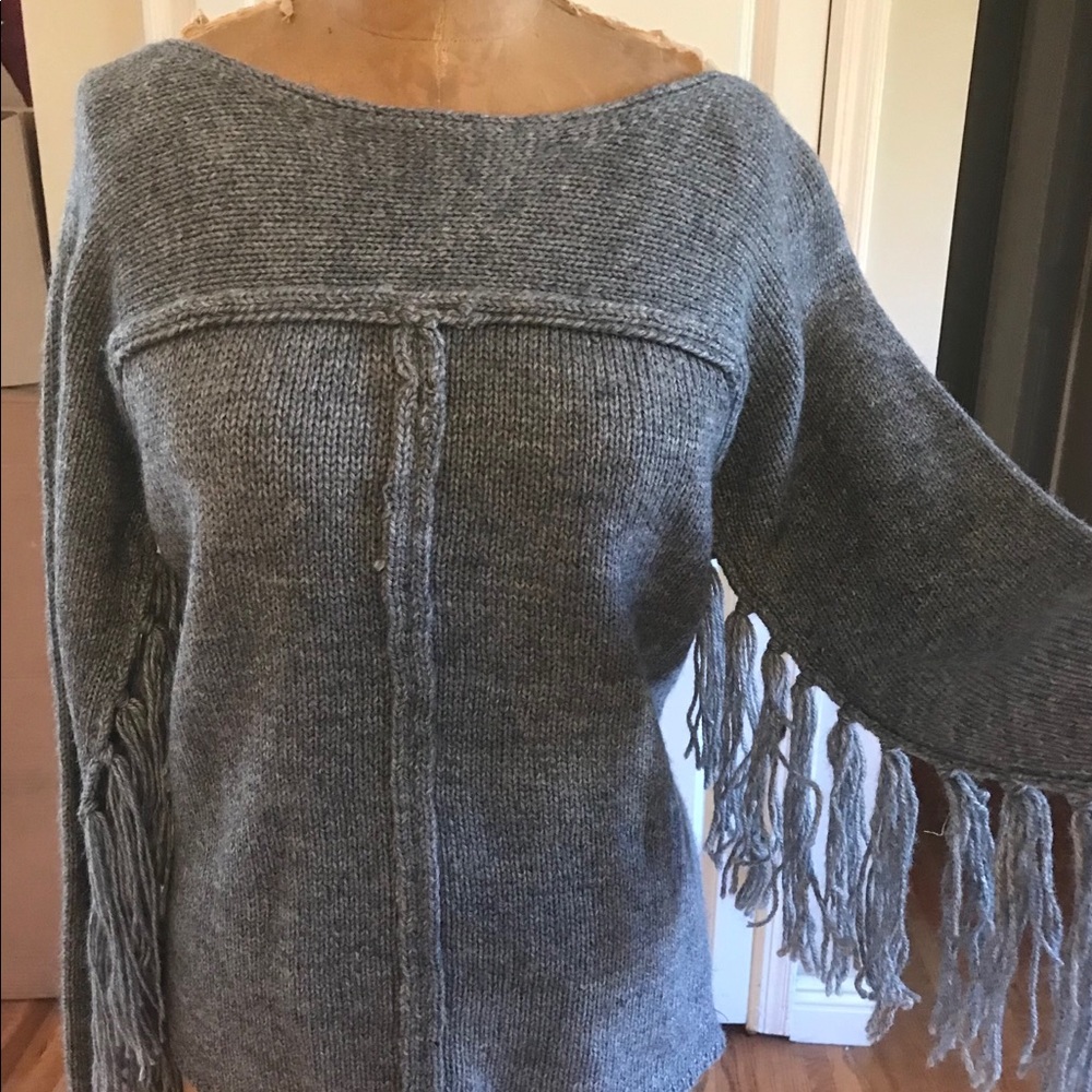 Grey sweater with fringe trim